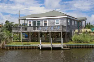 Image of Waterfront Home w\/private W\/D, A\/C, Free WiFi, gas grill, & Shared Pool