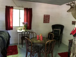 Image of very private,adorable rustic cabin -out house , & full shower house on property