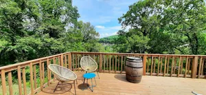 Image of Wooden house with terrace on stilts and superb view