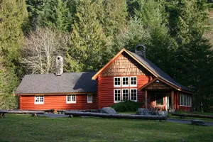 Image of This rare historic lodge at Mt. Rainier National Park has 4 bedrooms, Copper Creek frontage, a private hot tub on the creek, and is off the highway. Children welcome. Short walk to Copper Creek Restaurant.