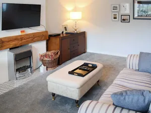 Image of Just 200 yards from the sweeping sandy beach, perfect for romantic strolls and playful pets.