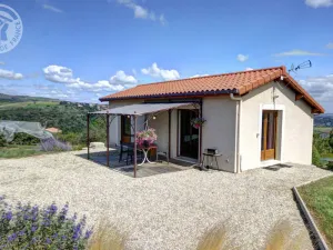Image of Charming Cottage with Private Terrace, Garden, and Modern Amenities in Genilac