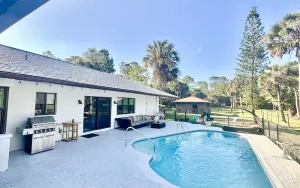 Image of Vacation pool home in the woods.