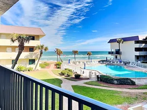 Image of Cheerful Oceanfront Condo With Resort Pool, Beach Access