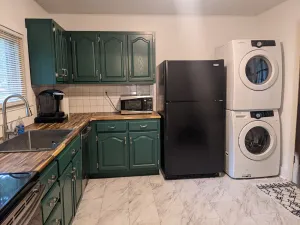 Image of Green and White Chattanooga Cottage-near interstates and free parking