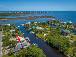 Image of Big Canal-front house, kayaks, canoes, game room, fish right from the dock.