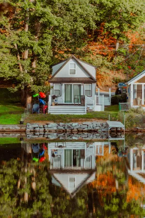 Image of Lakefront; view of ski mountain, firepit, dock, kayaks, paddle board