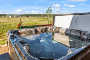 Image of Log Cabin 6BR, Hot Tub, Game Room, Fire Pits, Playground, Outdoor Kitchen
