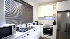 Image of THE TERRACES UNIT 4- beautifully renovated ground floor unit.