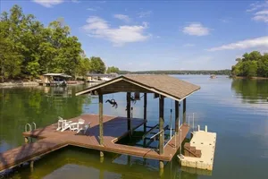 Image of 3 Bedrooms, 1 Flex Room, 2½ Bathrooms!  Covered Slip w\/Hoist! Wifi! Prime Location! Come Visit \"Doc