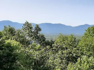Image of RELAX, UNWIND AND RECHARGE IN THE HOT TUB AT THIS MOUNTAIN VIEW COTTAGE