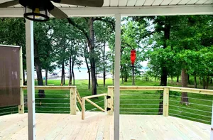 Image of Relaxing Lakefront Home w\/ Boat Dock, Fire-pit and private Walk-in Beach! Gated