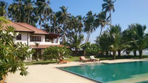 Image of Beachside Villa. Private Chef. Swimming Pool and Tennis court. 3 bedrooms. AC