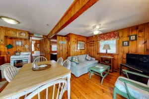Image of Rustic & well-equipped cottage near the ocean w\/gas grill, deck w\/chairs, & lawn