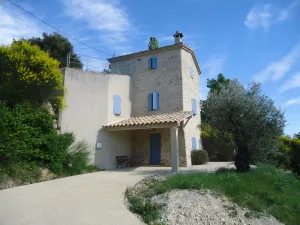 Image of Elegant Provencal house surrounded by vineyards and olive groves.