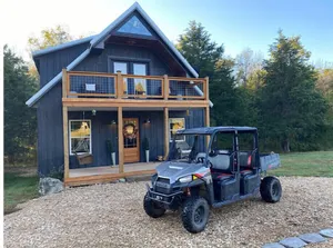Image of Unique\/modern, secluded cabin on 95 river front acres\/utv\/kayaks & hot tub