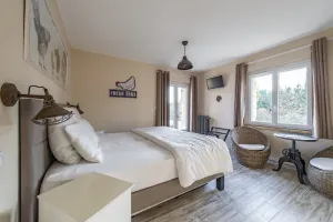 Image of Generous double room with large terrace and deckchairs, 2km from town center
