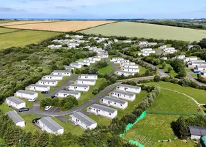 Image of State of the art contemporary styled holiday home with one master double and two twin.