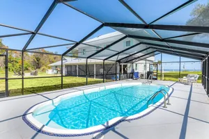 Image of Waterfront Haven: Sleeps 15, Heated Pool, Private Dock, Near Beach, Tranquility