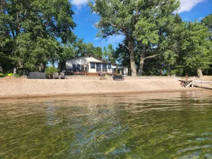 Image of Beautiful, family friendly Lake home w\/sunroom and 100ft of sandy beach!