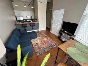 Image of Chic walkable apt with rooftop views