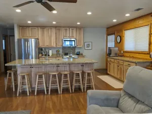Image of Paradise Cabin in the Pines<br>Comfortable Patios and porch swing <br>Watch kids play