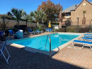 Image of Comfort & Convenience! w\/ Fully-equipped Kitchen, Parking & Pool Onsite!