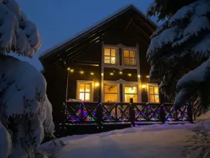 Image of Cosy detached Alpine chalet with log fire, balcony and mountain views - sleeps 8