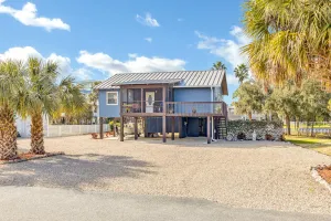 Image of Coastal Getaway on canal-steps to the beach