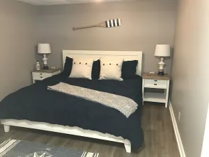 Image of Spacious two bedroom get away. Full kitchen with all supplies. 75 in tv…