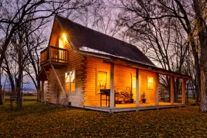 Image of Cozy Log Cabin located on scenic acreage with trees and privacy.
