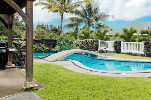 Image of Beautiful Pool with Stunning Ocean and Sunset Views