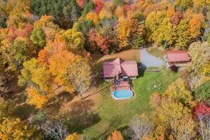 Image of Elegant log chalet w\/hot tub sitting on 36 private acres