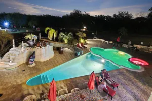 Image of 5 Acre Estate With 11 Bedrooms & Giant Pool w\/ Slide, Splash Park, & Crazy Golf!