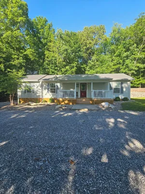 Image of Lake House  with easy water access, limited water view, sitting on 4 acres.