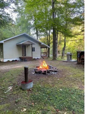 Image of Riverside cabin, fly-fish for trout or just relax!
