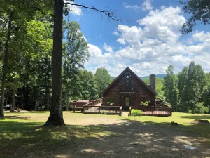 Image of Private New River Gorge getaway. Modern cabin w hot tub, fireplace, WiFi & views