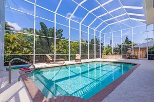 Image of Beautiful 4 bedroom, 3 bath w\/ heated swimming pool home 14 mins from the beach