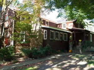 Image of Historic Farmhouse and horsefarm with trail riding and a pond.