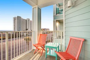 Image of Gulf view condo with balcony, pool, & fitness room - walk to beach