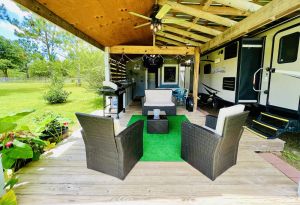 Image of Delightfully Tacky RV w\/ Outdoor Living Space