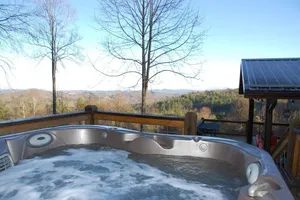 Image of 'View & Far Between' Cozy Mountain Home w\/ hot tub