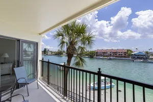 Image of Classy Waterfront Condo | Beach + Pool