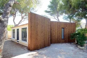 Image of architect house by the sea under the pines in a quiet area