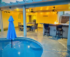 Image of Beautiful home W\/Pool, Spa, Fire pit & Outdoor grill.