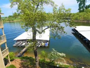 Image of Cute and cozy lake condo with cove water views (30x10 slip FREE with a rent).
