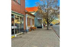 Image of \"Little Brick House on Main (1865)”