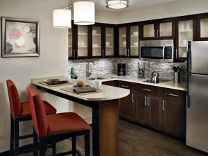 Image of Free Breakfast, Free Wi-Fi, Outdoor Pool | Comfy Suite in Plano