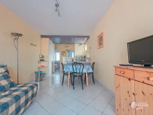 Image of Cozy Apartment Near Beach and Shops, with Balcony and Modern Amenities