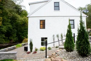 Image of Creekside Cottage with beautiful patio and hot tub!!